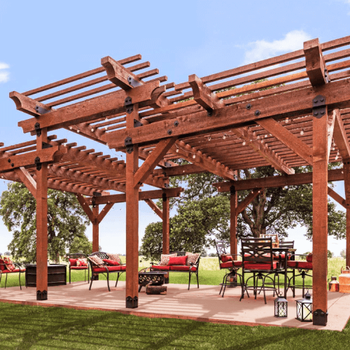Patio furniture and high-top table under a large wood pergola.