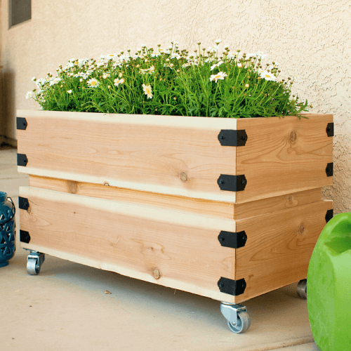 Handmade rolling wood planter box.