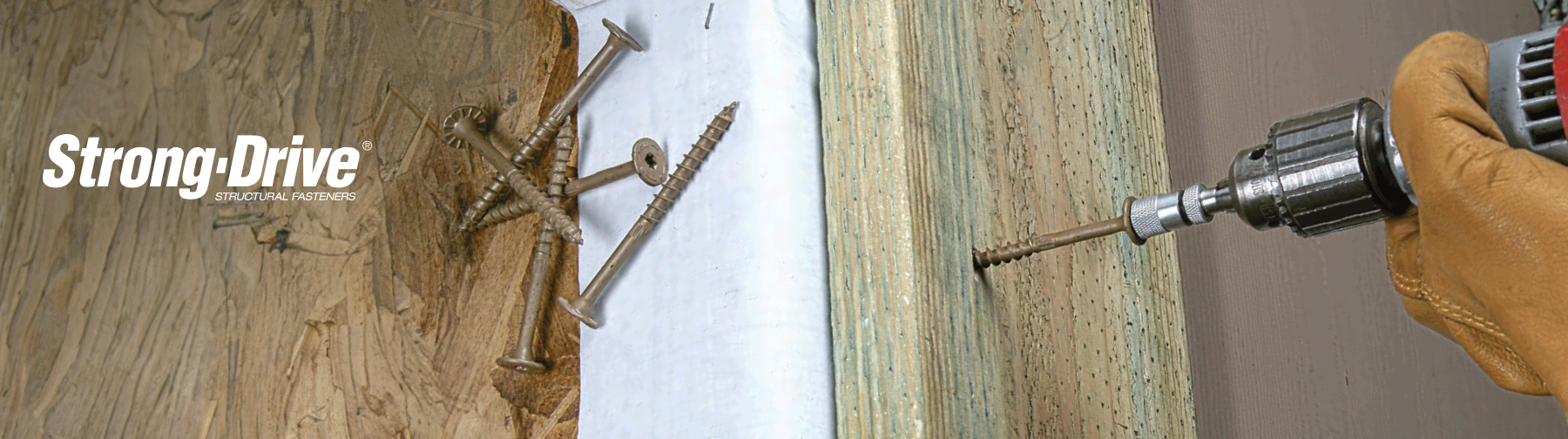 Close-up of Strong-Drive® structural fasteners embedded in a wooden beam, showcasing their strength and durability.