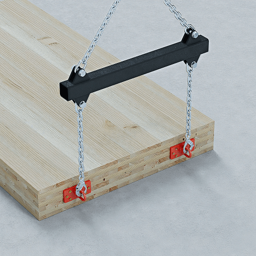 Lifting device with chains attached to a mass timber panel using red metal anchors on a concrete surface.
