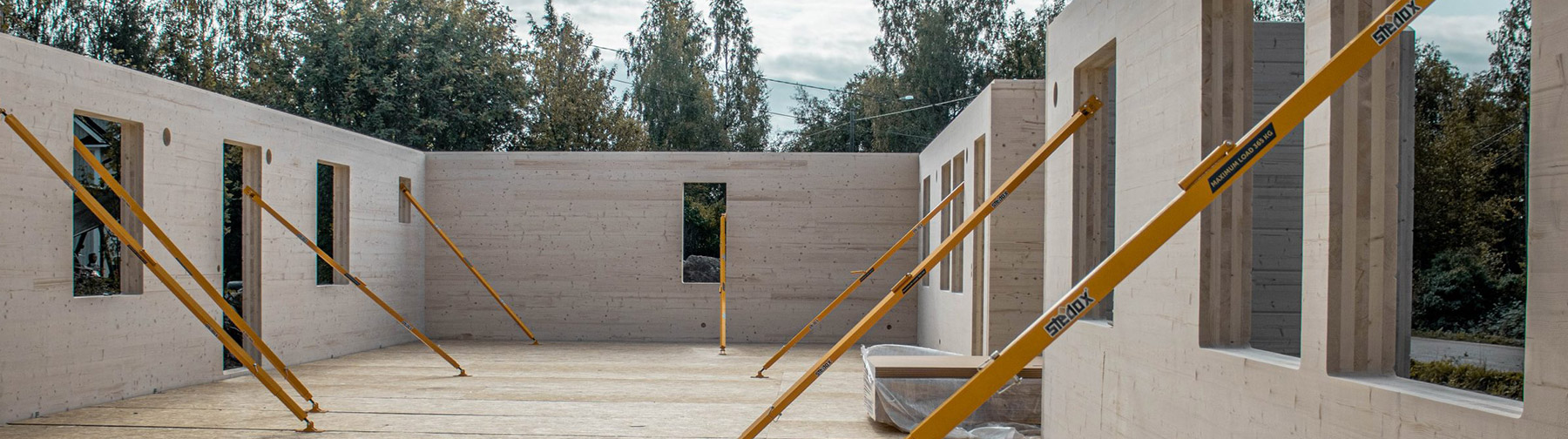 Construction site of wood frame interior with Stedox products bracing walls.